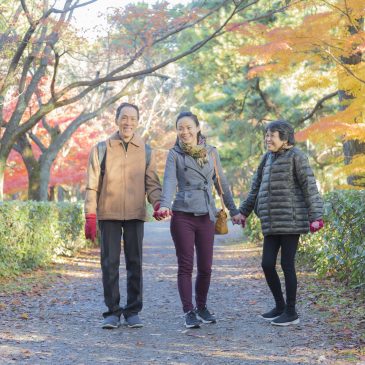WIth her parents, enjoying red maple leaves with our photographer. Kyoto, Japan